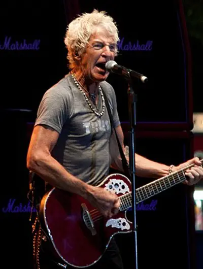 Kevin Cronin, American singer-songwriter, guitarist, and producer