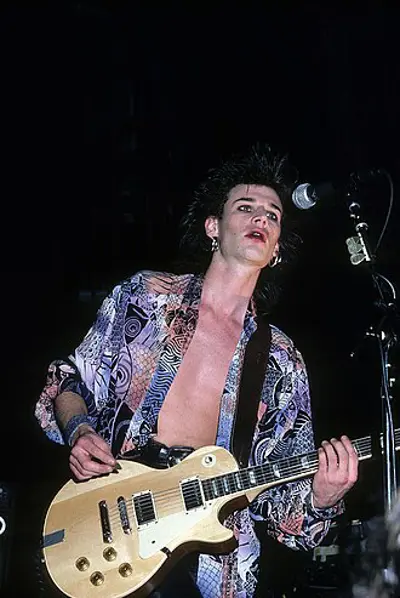 1957 daniel ash english singer songwriter and guitarist 07 31