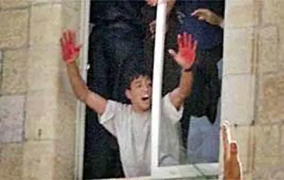2000 two israeli reservists are lynched by a palestinian mob at t 10 12