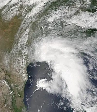 Tropical Storm Allison makes landfall on the upper-Texas coastline as a strong tropical storm and dumps large amounts of